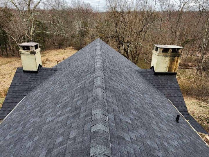 Storm damaged roof inspected by J and M Roofing